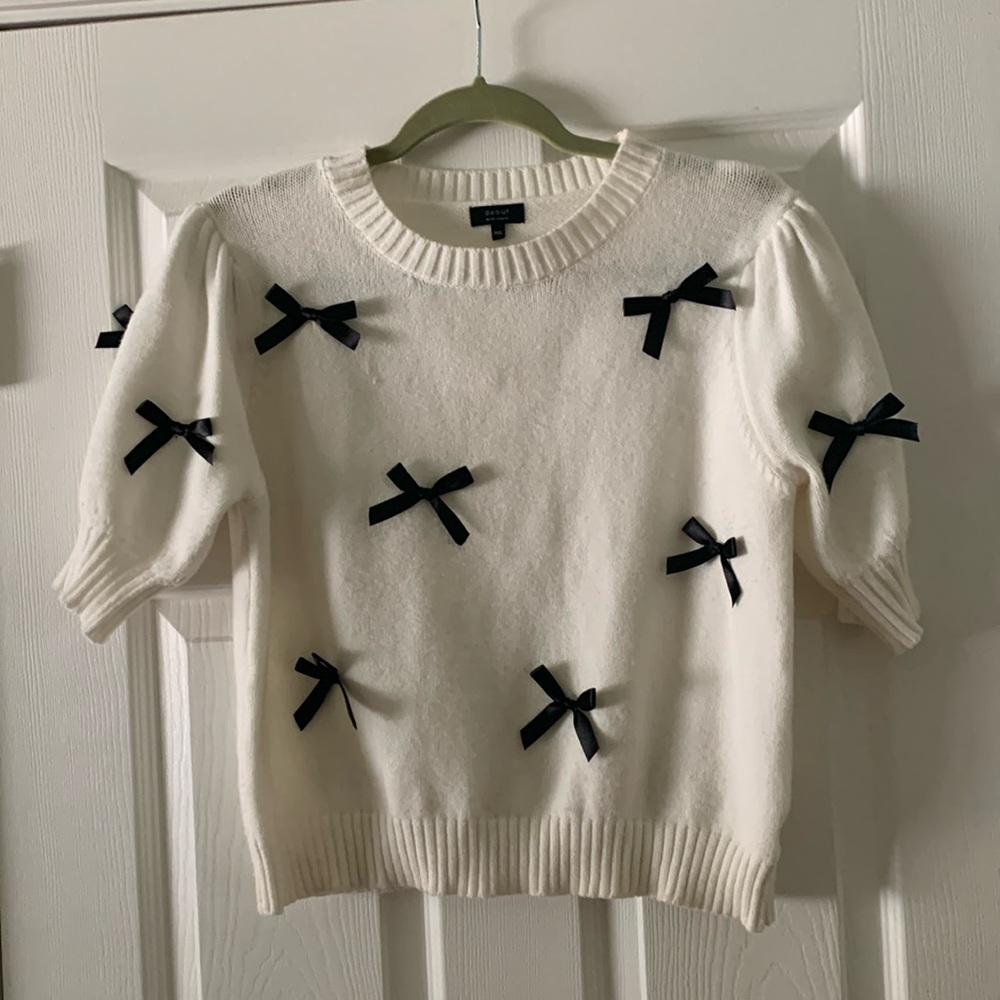White Sweater with Black Bow Detail